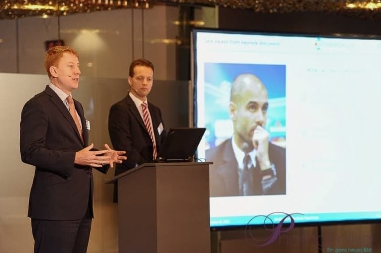 Professional business people at a presentation in a photo studio in Munich, modern event, high-quality photo production for business events.